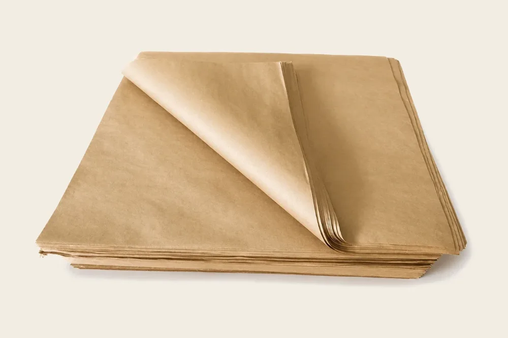 Papel Canela grado alimenticio: resma con un pliego levantado